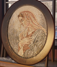 Intricate mosaic artwork featuring a serene figure with soft earth tones — crafted on a round wooden frame.