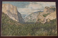 Intricate mosaic artwork depicting a serene mountain landscape with lush greenery and dramatic cliffs under a bright sky