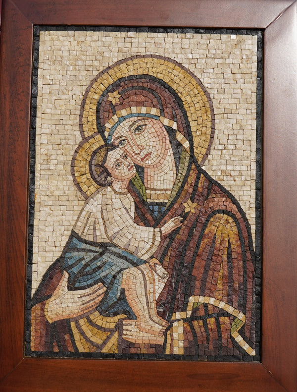 Intricate mosaic art depicting the Virgin Mary holding baby Jesus, framed in rich wood with warm tones and detailed textures.