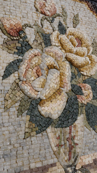 Intricate mosaic floral arrangement featuring soft beige and green tiles — showcasing delicate roses in a textured design.