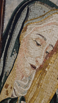 Intricate mosaic artwork depicting a serene face with flowing hair and soft colors, showcasing detailed craftsmanship.