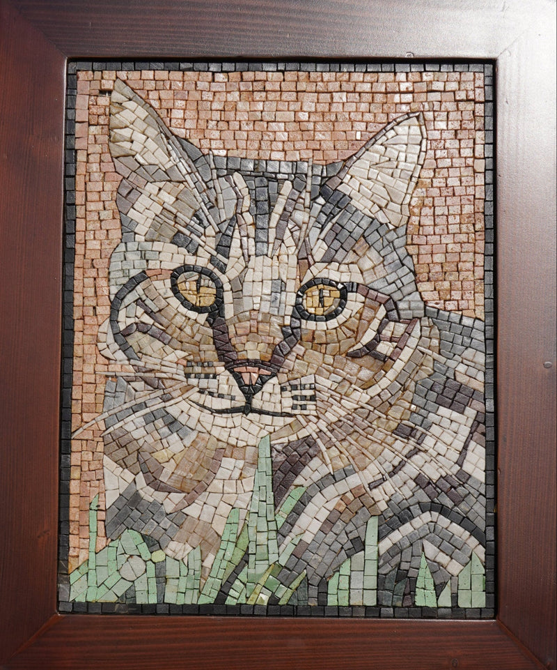Intricate mosaic artwork featuring a cat's face in earthy tones — detailed craftsmanship with glass and stone tiles.