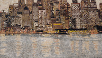 Intricate mosaic artwork depicting a city skyline at dusk — textured tiles create a shimmering water reflection.