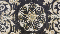 Intricate mosaic tile design featuring a floral star pattern in earthy tones of black, cream, and green — a stunning decorative art piece.