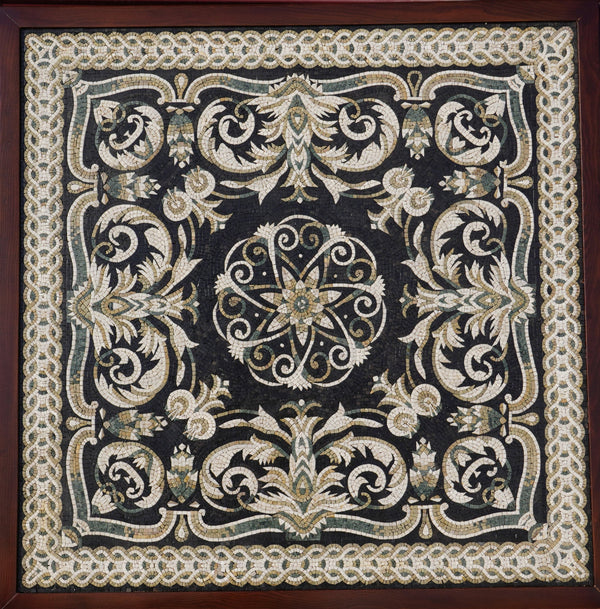 Intricate black tapestry featuring floral patterns and gold accents — a stunning piece of textile art with rich textures.
