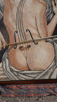 Artistic mosaic featuring a classical figure holding a cello — intricate tile work showcasing soft earthy tones and textures