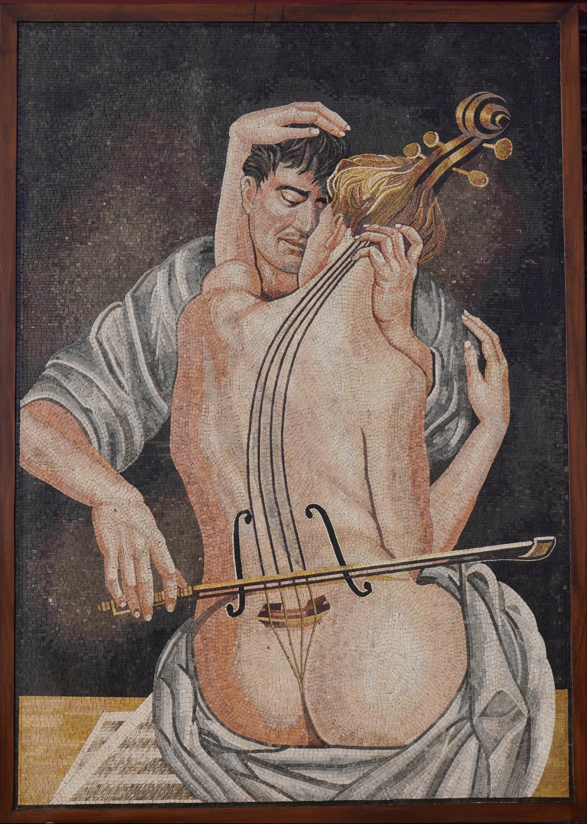 Intricate mosaic artwork depicting a couple embracing, with a cello elegantly positioned against a textured background.