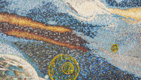 Vibrant mosaic artwork featuring swirling patterns in blue and gold tones — intricate design with textured tiles.