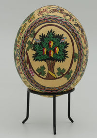 Intricately designed decorative egg featuring a vibrant tree motif with colorful birds — handcrafted with detailed artistry