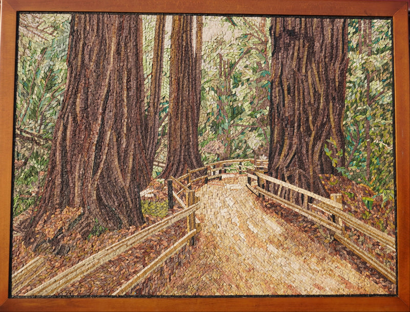 Intricate wooden puzzle depicting a serene forest path lined with towering trees and a rustic wooden fence.