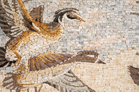 Intricate mosaic artwork depicting soaring birds in earthy tones — a stunning display of craftsmanship and detail.
