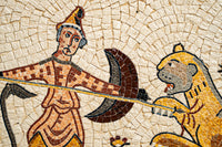 Mosaic artwork depicting a warrior with an axe confronting a lion — intricate details in earthy tones and textured tiles.