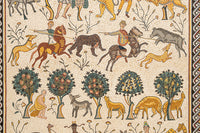 Intricate mosaic artwork depicting hunters on horseback amidst vibrant trees and animals — a rich tapestry of ancient storytelling