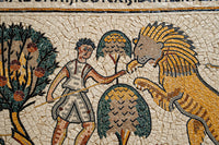 Intricate mosaic depicting a hunter with a spear confronting a lion amidst lush foliage — detailed craftsmanship in vibrant colors