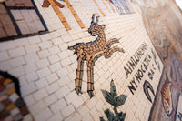 Intricate mosaic artwork featuring a stylized deer design in earthy tones — a captivating blend of craftsmanship and artistry