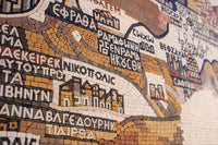 Intricate mosaic map design featuring detailed city names and pathways in warm earth tones — a stunning blend of artistry and geography.