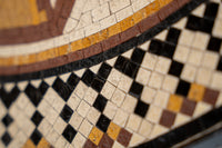 Intricate mosaic tile design featuring a blend of earthy browns and creamy whites — geometric patterns with a glossy finish