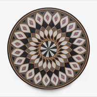 Decorative plate with a geometric pattern on a white background