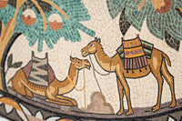 Vibrant mosaic artwork depicting two camels against a backdrop of lush greenery — intricate detailing in earthy tones.