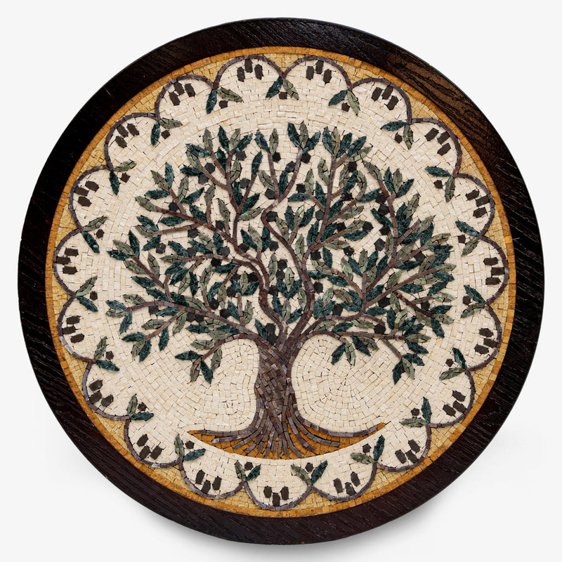 Intricate mosaic wall art featuring a tree design with green leaves on a circular wooden base — crafted with detailed artistry.