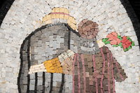 Intricate mosaic artwork depicting a couple embracing, featuring natural stone tiles in warm earth tones and vibrant greens.