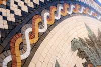 Intricate mosaic tile artwork featuring vibrant colors and geometric patterns — a stunning blend of craftsmanship and design.