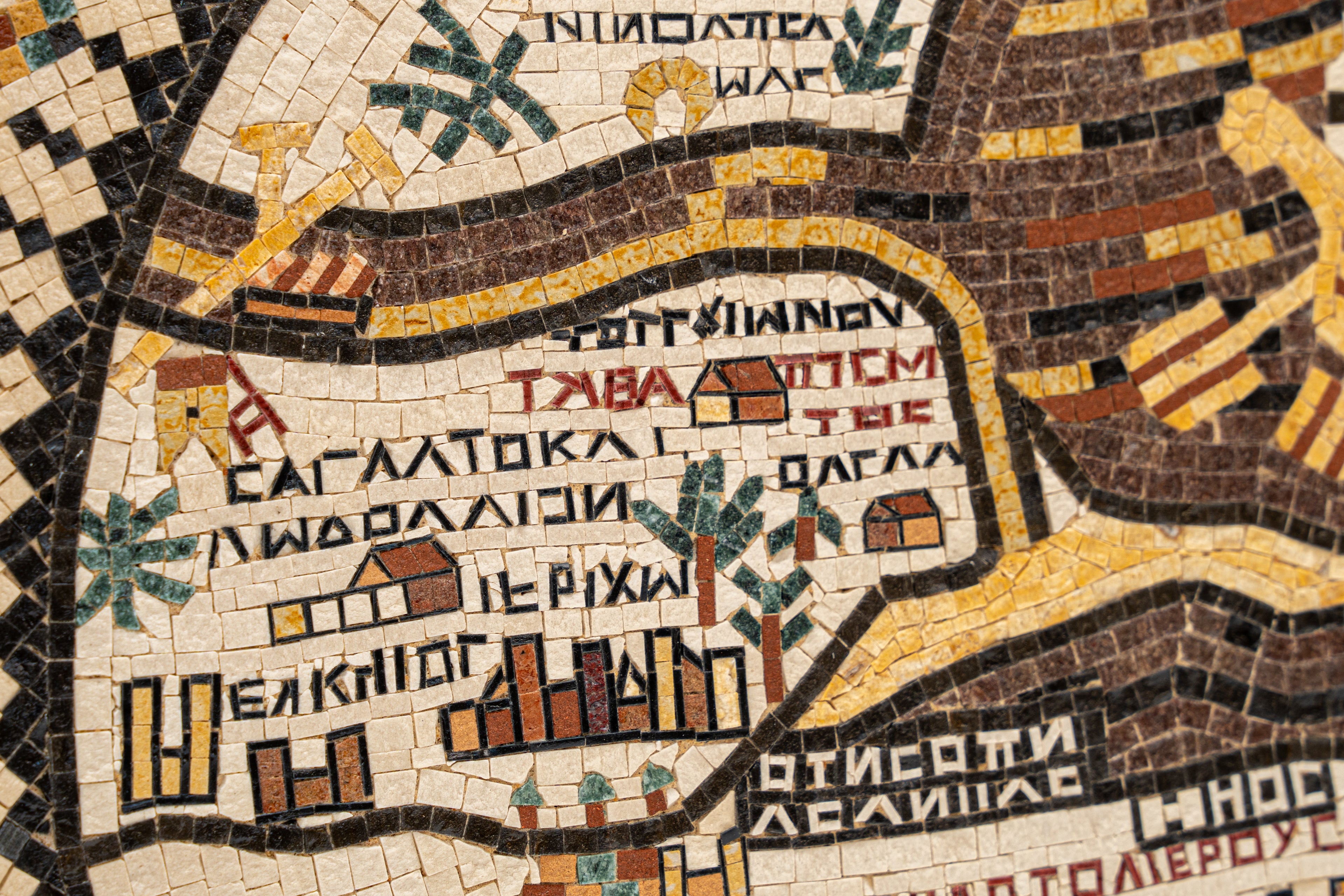 Intricate mosaic artwork featuring detailed patterns and vibrant colours, showcasing a rich historical map design.