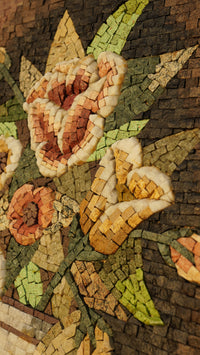Intricate mosaic wall art featuring floral designs in earthy tones of terracotta and green — handcrafted with natural stone tiles.