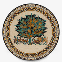 Intricate mosaic table featuring a vibrant tree design with gold and green leaves surrounded by animals in earthy tones