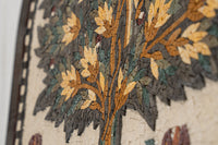 Intricate mosaic wall art featuring a vibrant tree design in earthy tones of brown, green, and ochre — a stunning handcrafted piece.