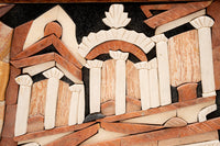 Intricate mosaic artwork featuring stylized columns and arches in earthy tones, showcasing a blend of textures and patterns.
