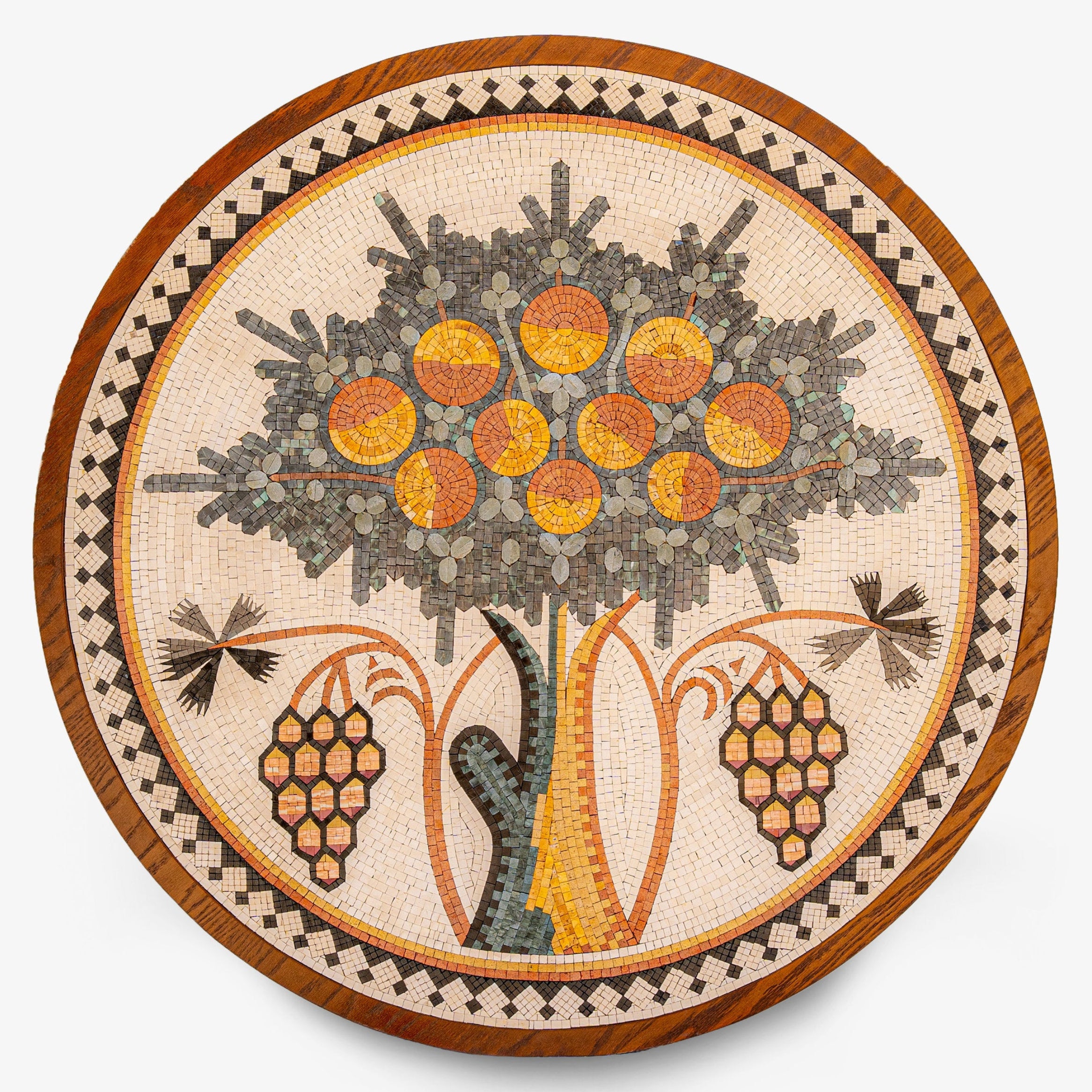Intricate mosaic wall art featuring a tree with vibrant orange fruits and detailed grape clusters on a circular wooden frame