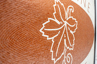Intricate mosaic design featuring a leaf motif in warm terracotta tones — a unique decorative wall art piece.