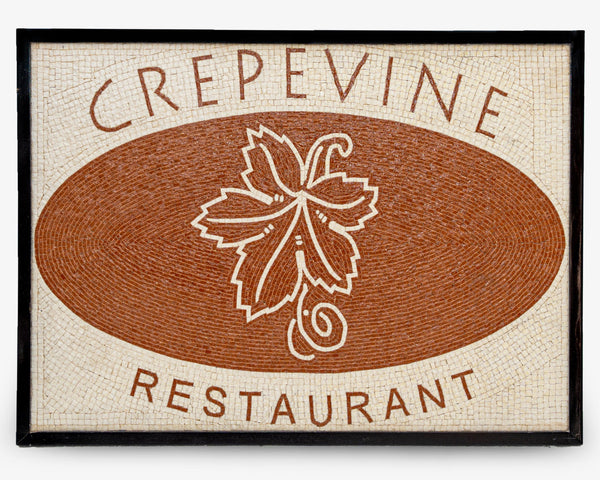 Artisan mosaic sign for Crepevine Restaurant featuring a textured brown background with a detailed leaf design