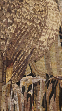 Intricate mosaic artwork featuring a bird with textured feathers in earthy tones — a stunning blend of natural materials.