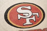 Vibrant mosaic featuring the San Francisco 49ers logo in red and gold with intricate tile detailing.
