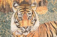 Intricate mosaic artwork featuring a tiger's face with vibrant orange and black hues, showcasing detailed craftsmanship.