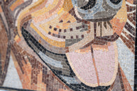 Colorful mosaic artwork featuring intricate patterns and textures — a blend of natural stone pieces in various hues.