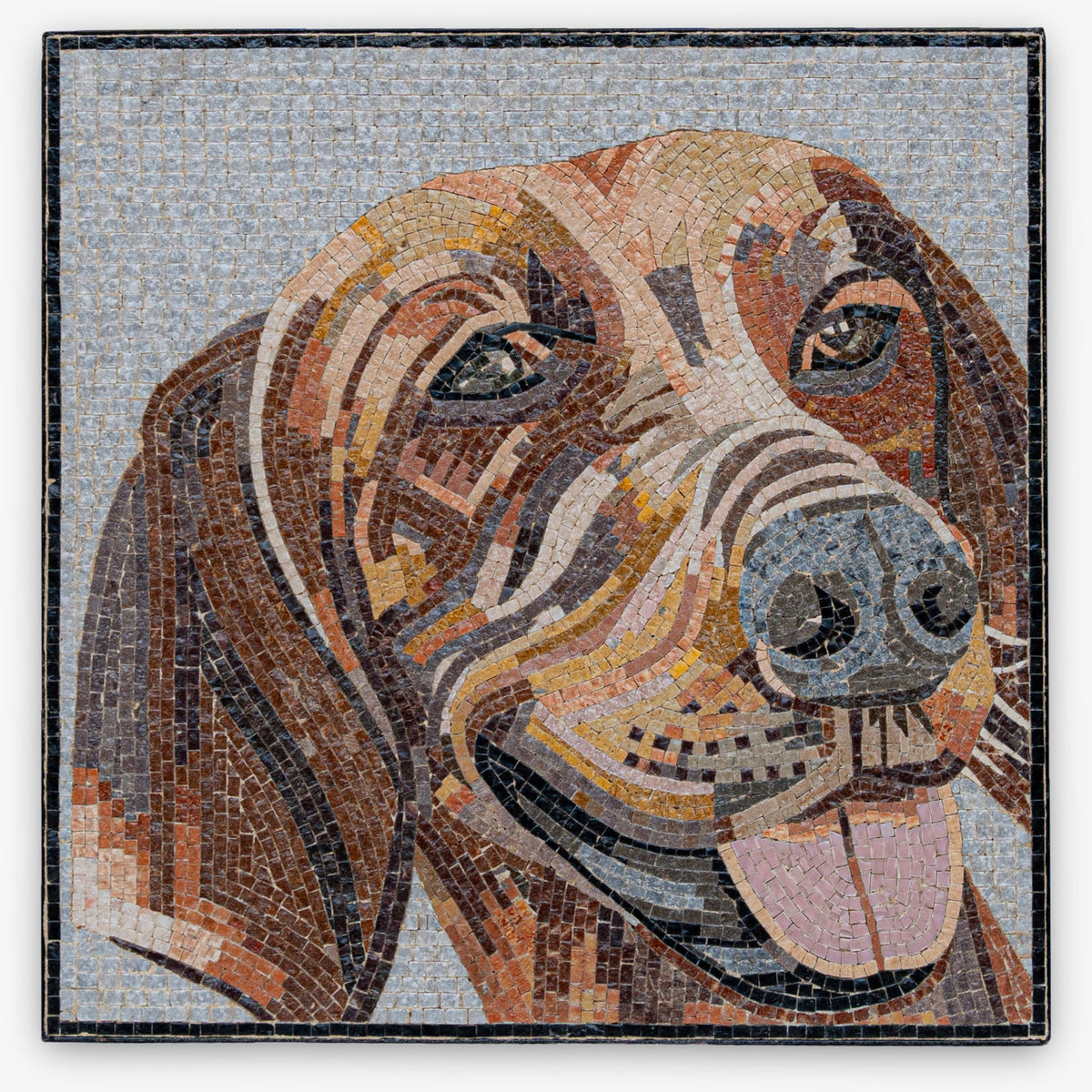 Colorful mosaic artwork depicting a cheerful dog with intricate tile patterns and a textured finish on a light background