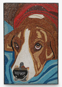 Intricate mosaic artwork depicting a brown and white dog resting on a blue background — showcasing detailed craftsmanship and texture.