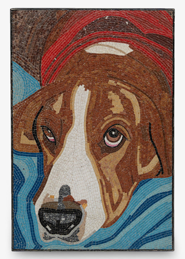 Intricate mosaic artwork depicting a brown and white dog resting on a blue background — showcasing detailed craftsmanship and texture.