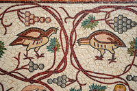 Intricate mosaic art featuring stylized birds and floral motifs in earthy tones — a stunning depiction of ancient craftsmanship.
