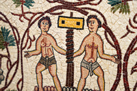Intricate ancient mosaic featuring two stylized figures standing beside a tree — detailed craftsmanship with vibrant colors.