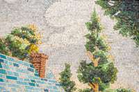 Intricate mosaic art featuring a chimney atop a blue-tiled roof with vibrant green trees against a cloudy sky backdrop