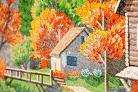 Intricate mosaic artwork depicting a quaint house surrounded by vibrant autumn trees in shades of orange and yellow