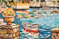 Vibrant mosaic artwork featuring a colorful waterfront scene with a small boat and floral accents on textured tiles.