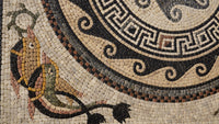 Intricate mosaic art featuring a colorful fish design with earthy tones and geometric patterns on a textured surface