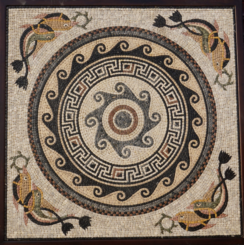 Intricate mosaic art featuring a central spiral design with colorful fish and floral motifs — crafted from natural stone tiles.