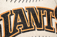 Textured mosaic baseball featuring the word 'GIANTS' in bold black and orange lettering against a cream background