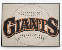Mosaic baseball-themed welcome mat featuring the word 'GIANTS' in bold black and orange letters against a neutral background